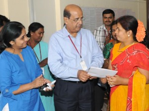 CEO -RFS of Jayalakshmi handing over sanction letter to 1000th customer Gayatri Rajendra