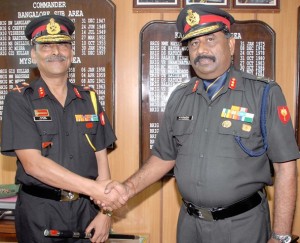 Major General AK Singh (left) taking over as the new GOC from Major General KS Venugopal at the Karnataka and Kerala Sub Area In Bangalore today 
