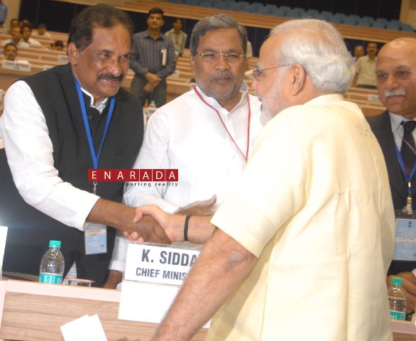 The  Chief Minister Mr Siddaramiah  and  Minister for Home Mr KJ George speaking with Chief Minister of Gujarath Mr.Narendra Modi at the Chief Ministers’ Conference on Internal Security, in New Delhi. 