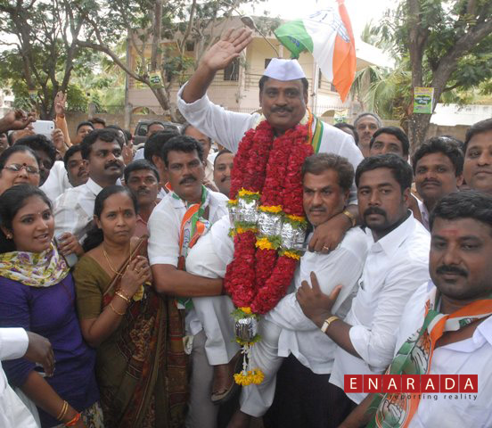 Congress candidate R. Dharamasena in a jubilant mood after winning