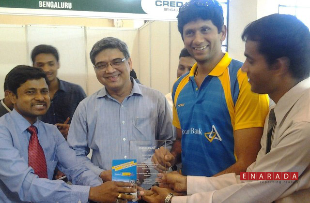 Cricketer Venaktesh Prasad honoring participants. Anil Nayak, CEO, CREDAI Bengaluru , looks on