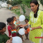 Art of Giving volunteers celebrating I-day with street kids. Ph